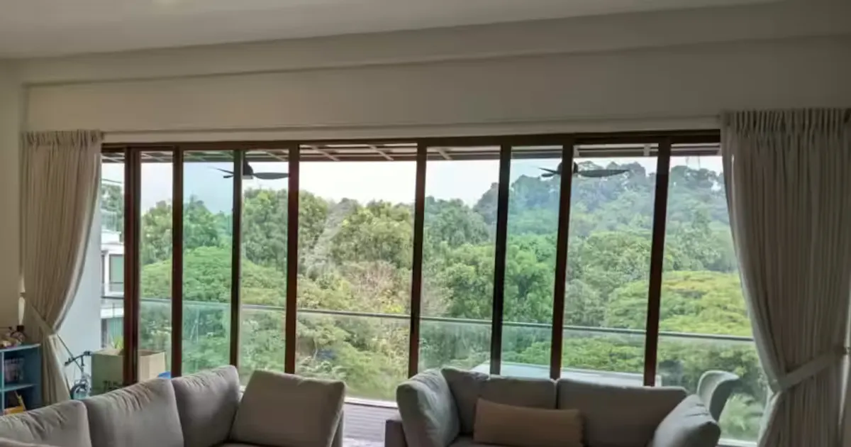 Two Moms Curtains living room with curtains framing a wide window