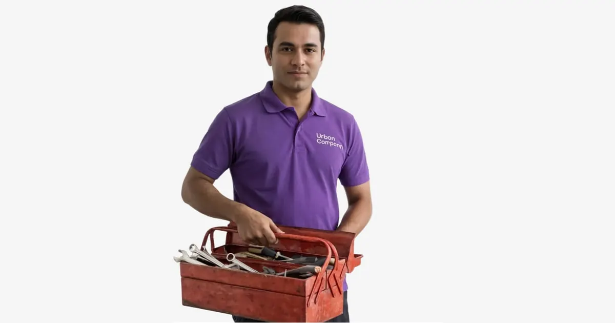 Urban Company handyman holding a toolbox