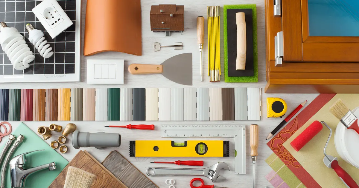 FixinGuru tools, paint roller and materials laid out