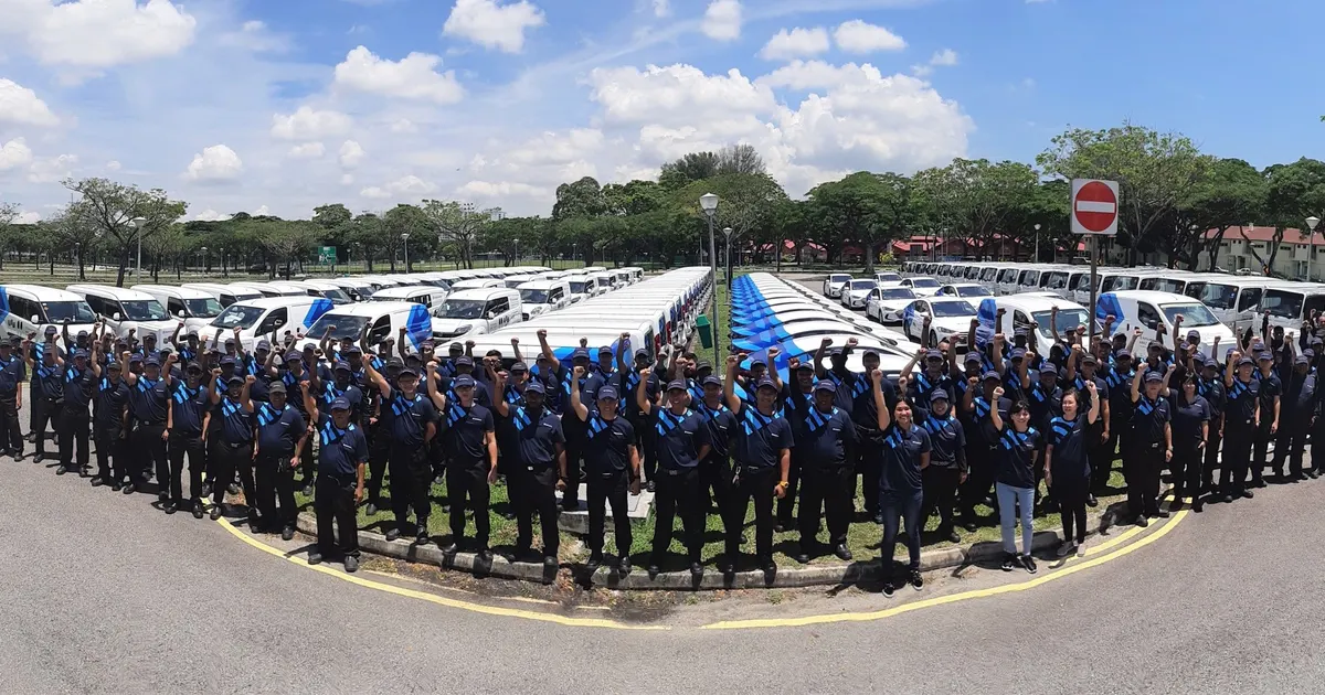 Anticimex Singapore team with service vans